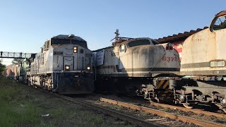 Trem da Rumo containers cruzando com o translado das V8 e BUDD