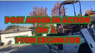 Testing a post auger on a 1-ton Chinese excavator: Installing a temporary power pole at a jobsite.