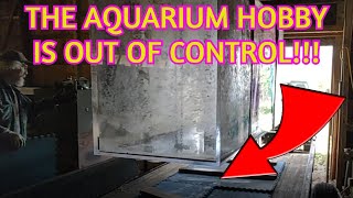 MOVING A MASSIVE AQUARIUM!!! // 720 GALLON TANK GETS LIFTED!!!!!