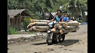 overloading  motorcycle in the Philippines | habal habal | with extreme motorbike logging transport