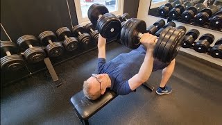 Gymday. Teaching my brother dumbbell press technique. 25kg for reps pb.