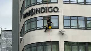 A man cleaning window