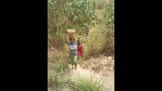 Hauling sand to church site