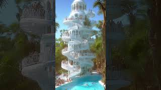 Mesmerizing Spiral Staircase with Pool and Palm Trees – Watch the Descent!