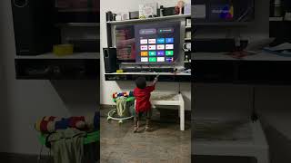 One year boy operating TV remote #baby #babyboy #smartbaby #ytviral #yt #ytshort #shortvideo #salaar