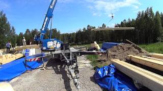 log cabin project: hoisting logs