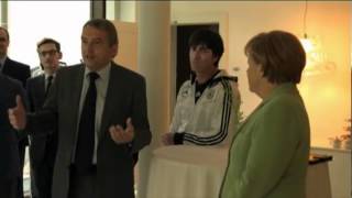 Merkel rallies Germany's Euro 2012 squad.