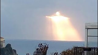 Man captures glowing figure shining through clouds: Many say it looks like Christ the Redeemer