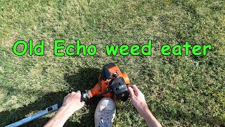 Old Echo weed eater