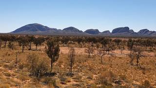 Panoramic view from Olgas to Ayers Rock. Aug 28th, 2019 from Kata Tjuta Dunes Viewing Area..