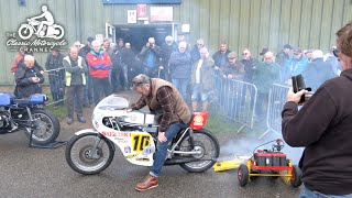 An eclectic group of classics bikes starting-up at a show