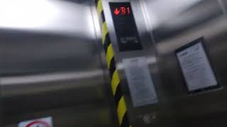 Mitsubishi elevator at MRT blue line Chatuchak Park Station Bangkok Thailand (retail & exit)