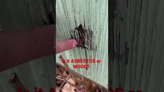 Wood siding or Asbestos siding… find a damaged spot or take a piece off.  Test with lab if needed.