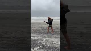 Why Is This Guy Juggling On The Beach During A Hurricane?