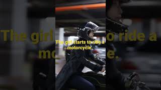 Chinese girl starts to ride a motorcycle.