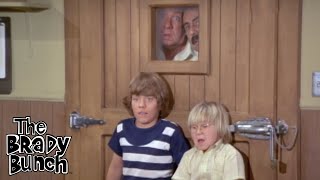 Bobby Brady and Oliver Lock Sam in a Meat Freezer