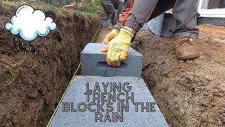 Laying trench blocks- Another soggy day