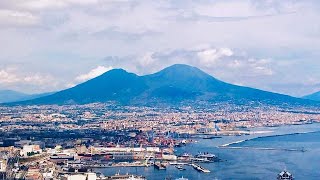 Volcanic Mountain (Vesuvio) in Naples & panorama of Casavatore (highly densilated city in Italy).