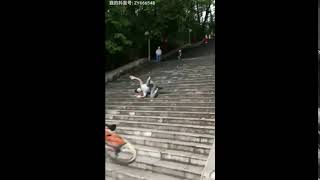 Dafuq Was He Thinking? Man On A Bicycle Crashes After Going Down Steps!