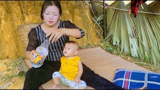 Single mother fences her garden, waters vegetables and takes care of her small children