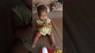 Eating olives a baby #shorts #shortsvideo #viral #viralvideo #baby #babygirl #cute #cutebaby #play