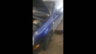 Chevrolet Optra 2005 how to drain radiator