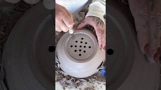 Adding holes to a ceramic bowl #pottery #ceramics #berrybowl #clay #relaxing #satisfying #berrybowl