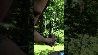 shooting the slingshot backwards using the camera to aim. #slingshot #trickshot