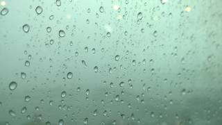 Rain on a Window - Beautiful background video and rain sound effect