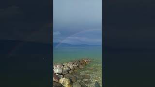 Splendido panorama sul Garda con arcobaleno