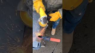 Removing Rust from a Splitting Maul with a Grinder