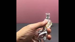 Glass perfume bottle 25ML flat round portable perfume bottle