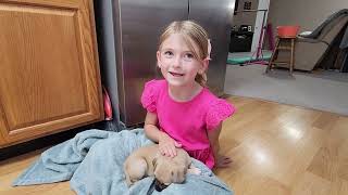 Scarlett gets an early birthday surprise...a new puppy!!! She is still in shock ("is this a dream?")