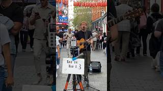 LONDON STREET MUSICIAN PERFORMING LIVE MUSIC