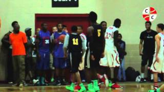 Chris Cokley facials defender and Dante Buford rises up for alley-oop