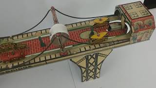 Marx busy bridge tin toys. Bauder estate Auction Huron SD. www.benmeyerauctions.com