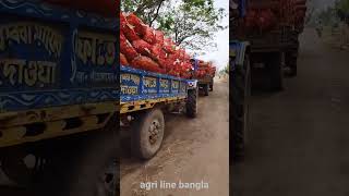 alu loading village tractor