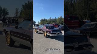 Maroon Oldsmobile 442 on gold Forgiato Wheels arriving to the ‘24 Juice New Years Day Rideout