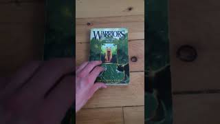 An old copy of Warrior Cats Into the Wild (read description)