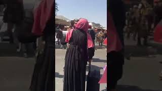 TALIBAN MEMBERS END A PROTEST BY WOMEN IN KABUL