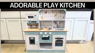 Adorable Play Kitchen with Opening Cabinets, Light Up Burners & More