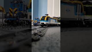 Lego train locomotive 60336 pulling a two car passenger train around the railway | #legotrains