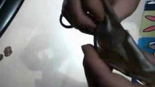 how to put a coin through rubber