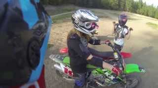 Girl riding Kawasaki KX250F Wins a race against a guy riding a RMZ450