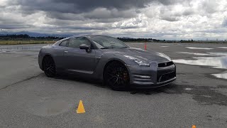 Driving new Nissan GTR for the first time .