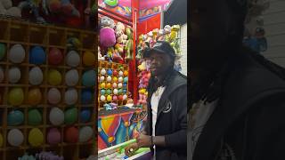 Playing the dart balloon game at the carnival #shorts #carnival #games