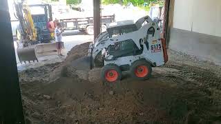 Digging the garage floor for concrete (time lapse)