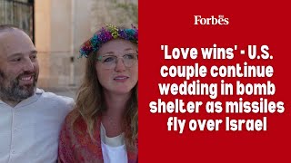 'Love wins': US couple continue wedding in bomb shelter as missiles fly over Israel