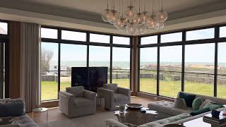 The Ocean Room - Future Automation TV LIft + Lutron Sivoia QS automated shades