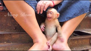 Baby Angela cry loudly, closing her eyes even as mom KT try to comfort her. Angela is very spoiled